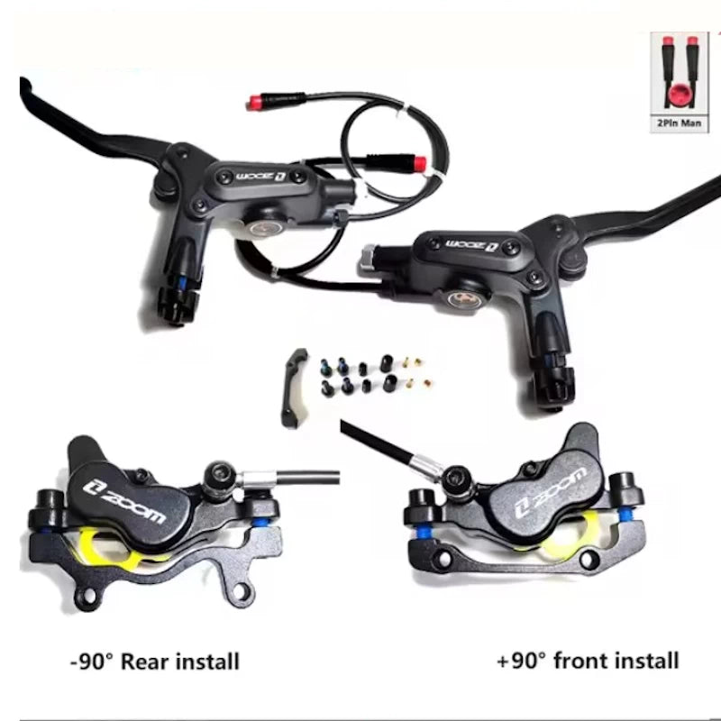 Zoom 4-piston hydraulic brake kit contents including front and rear callipers, pre-installed hydraulic brake lines and high performance brake levers
