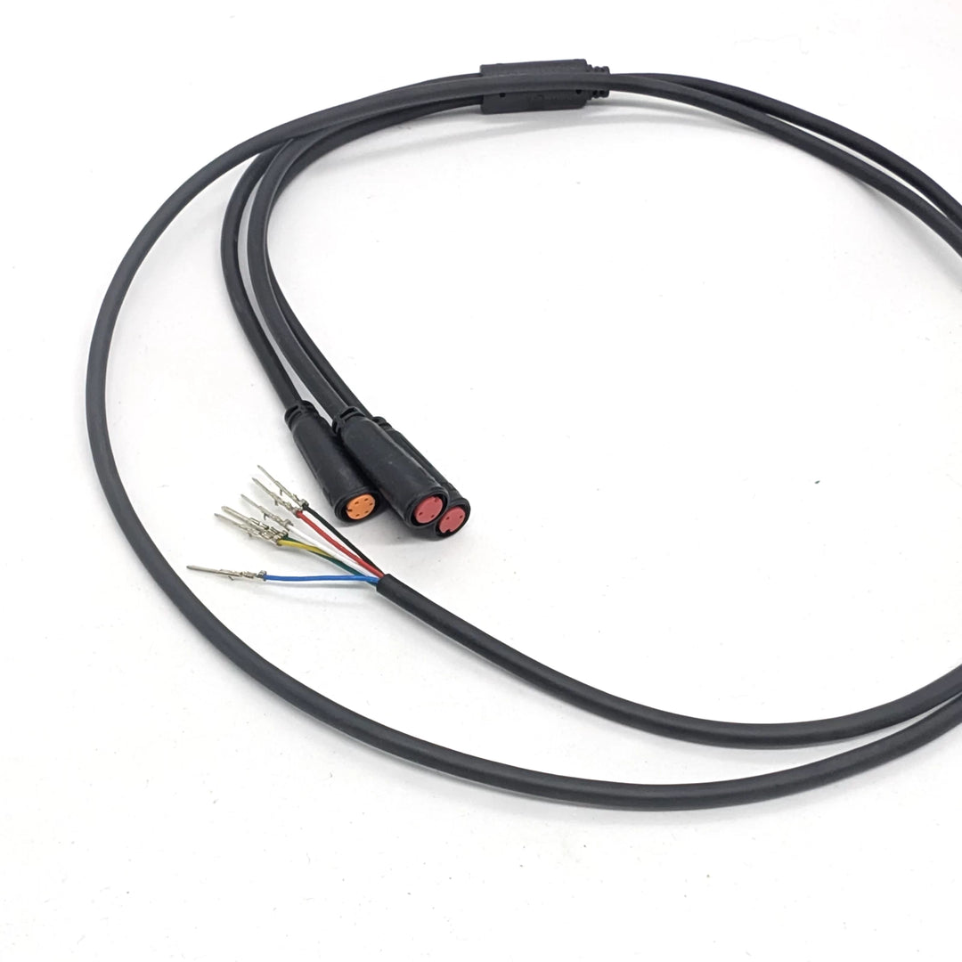 Angled view of OEM main wiring harness with waterproof Julet connectors for Bexly Blackhawk and Apollo Phantom V2.
