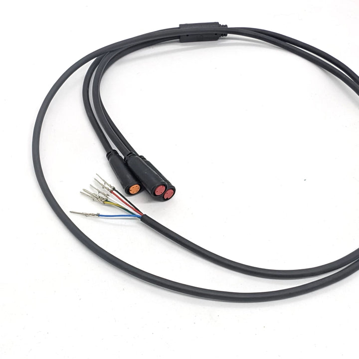 Angled view of OEM main wiring harness with waterproof Julet connectors for Bexly Blackhawk and Apollo Phantom V2.
