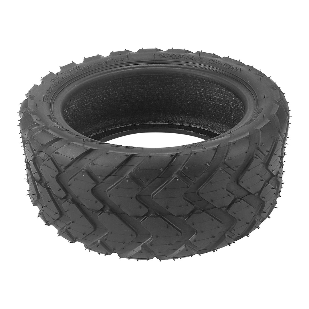 Chaoyang 80/60-6 heavy duty tubeless scooter tyre lying flat, providing view of tread and interior.