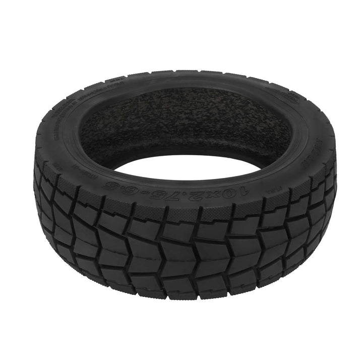 flat lay of tubeless electric scooter tyre showing full tread and inner lining