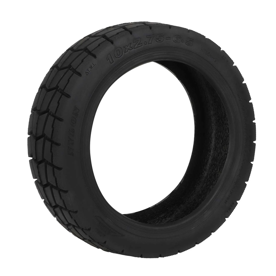 front angled view of tubeless scooter tyre with aggressive hybrid tread pattern