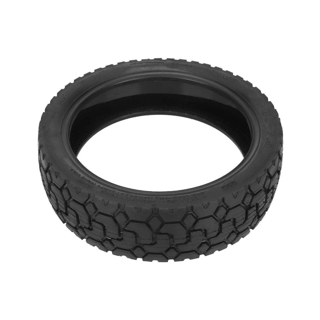 70/60-7.5 self-healing tyre laid flat, showing tread and glue self-repairing layer inside
