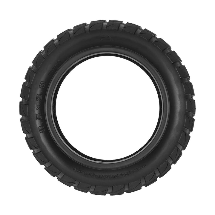 Side profile view of 8.5x3.0 tubeless electric scooter tyre showing aggressive off-road tread pattern and tyre wall markings.