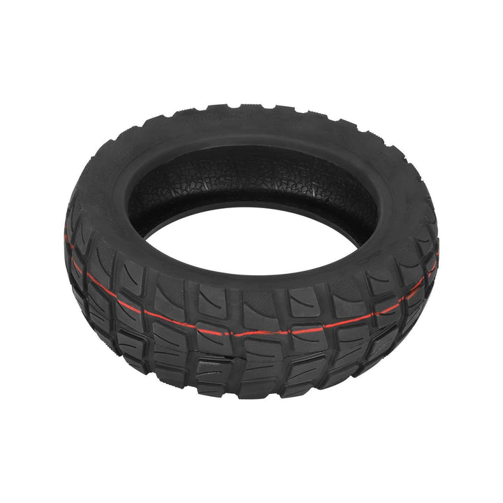 Angled tread view of 80/65-6.5 tubeless scooter tyre showing off-road blocks and grooves