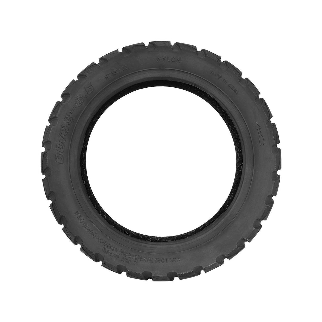 Side profile of off-road scooter tyre showing 80/65-6.5 size marking and rotation arrow