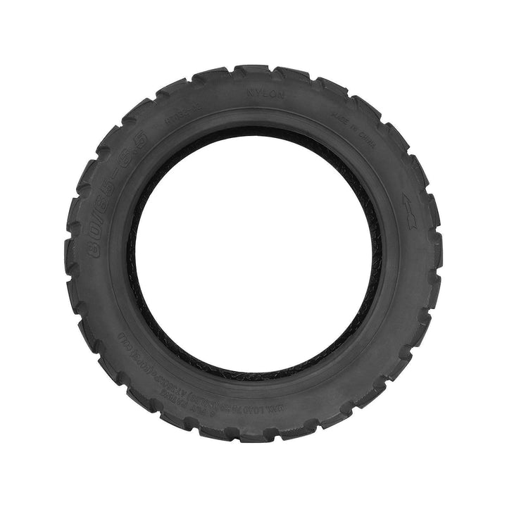 Side profile of off-road scooter tyre showing 80/65-6.5 size marking and rotation arrow