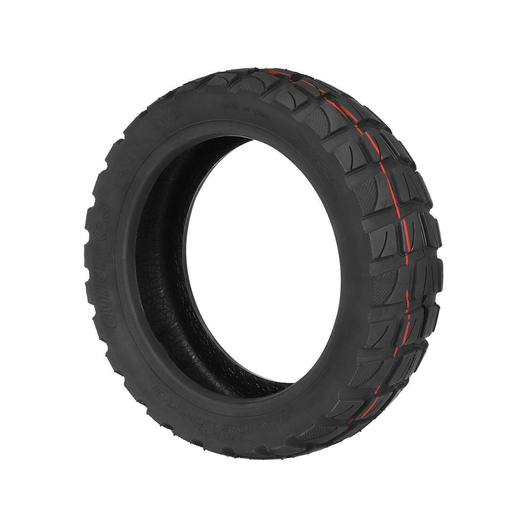 Angled view of KUGOO M4 and M4 Pro replacement tyre showing tread blocks and shoulder pattern