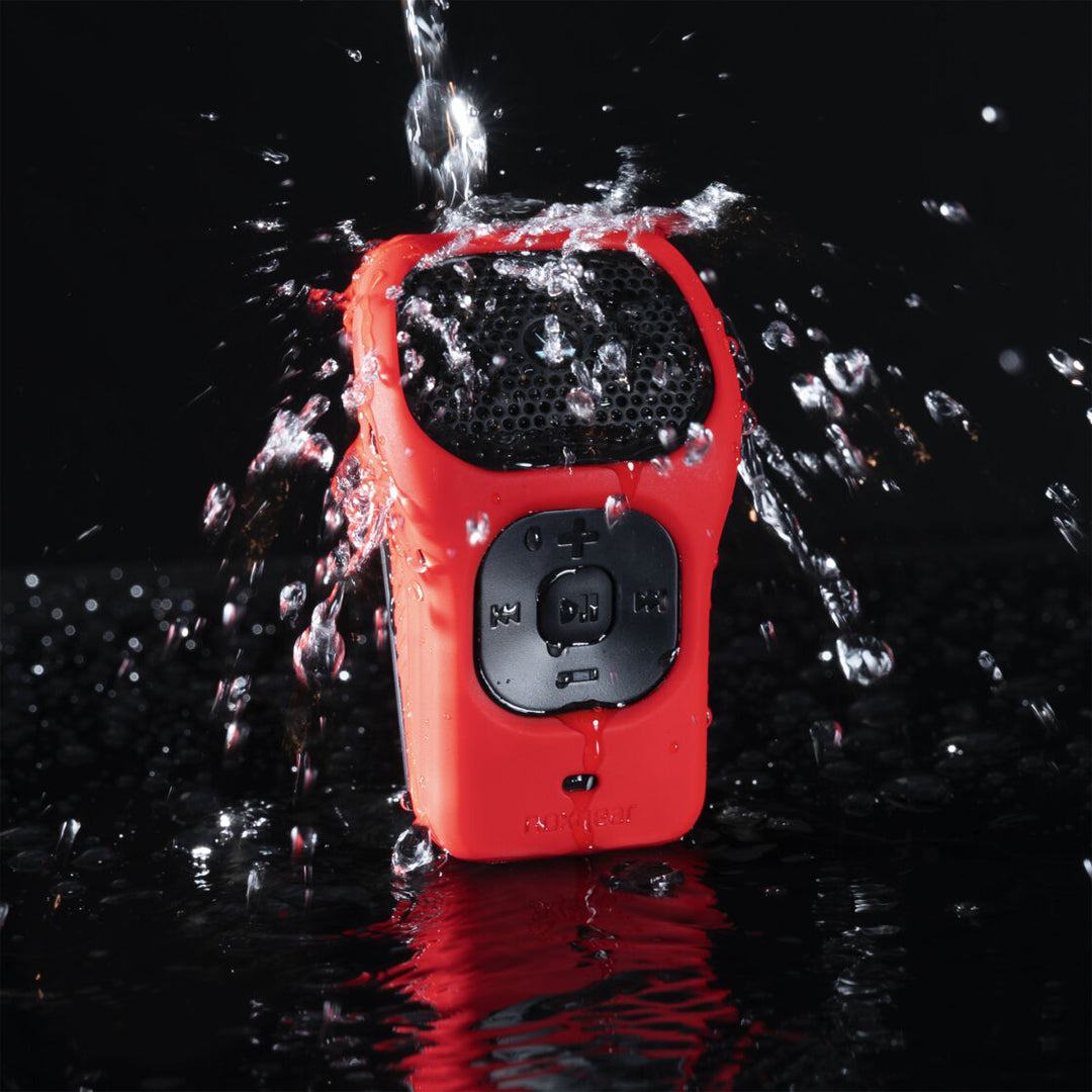 Noxgear 39g speaker fitted with Red Hot silicone skin demonstrating durable outdoor performance in wet conditions.