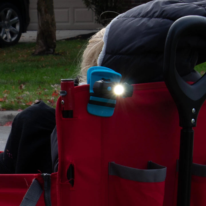 Noxgear rechargeable 500 lumen Clip Anywhere light illuminating stroller in low light