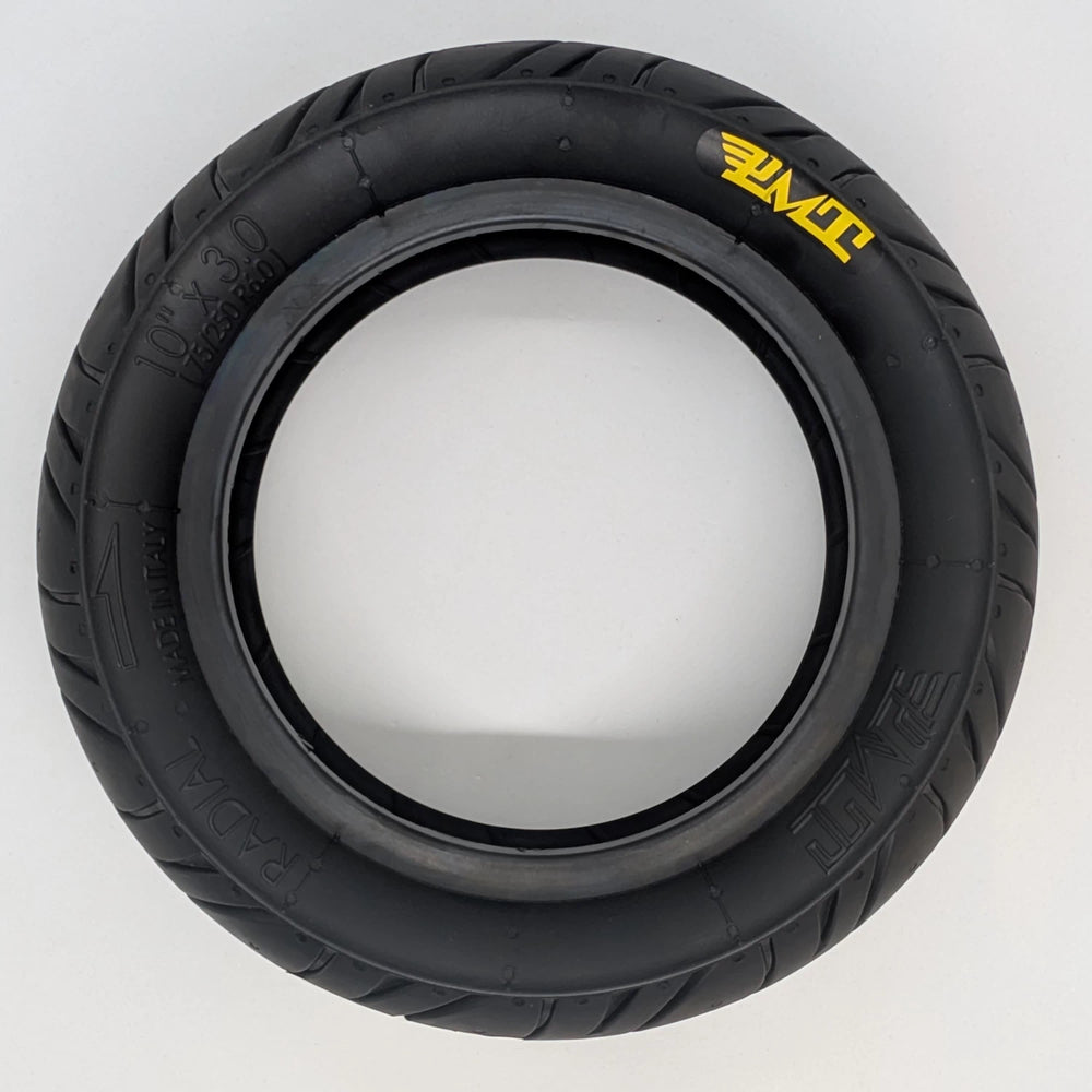 Full profile view of the PMT 10x3.0 (75/250-R6.0) E-Fire Radial Tyre.