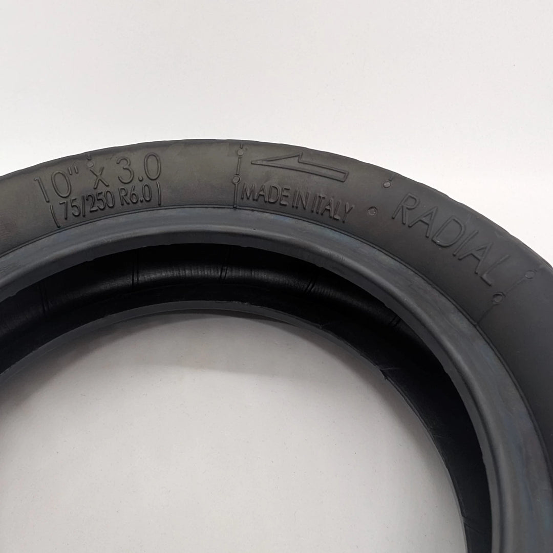 Close-up view of the embossed sizing on the sidewall of the PMT 10x3.0 (75/250-R6.0) E-Fire Radial Tyre, made in Italy.