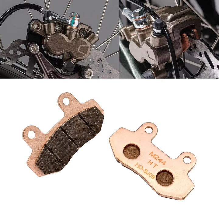 Surron Ultra Bee brake calliper and sintered pads showing friction faces and backing plates