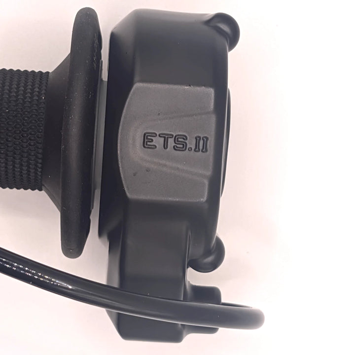 Close-up view of the ETS.II marking on the original Surron Ultra Bee electronic throttle housing