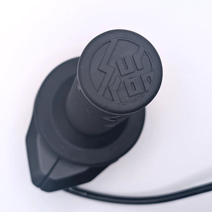 Moulded Surron logo on the end of the Ultra Bee throttle rubber grip