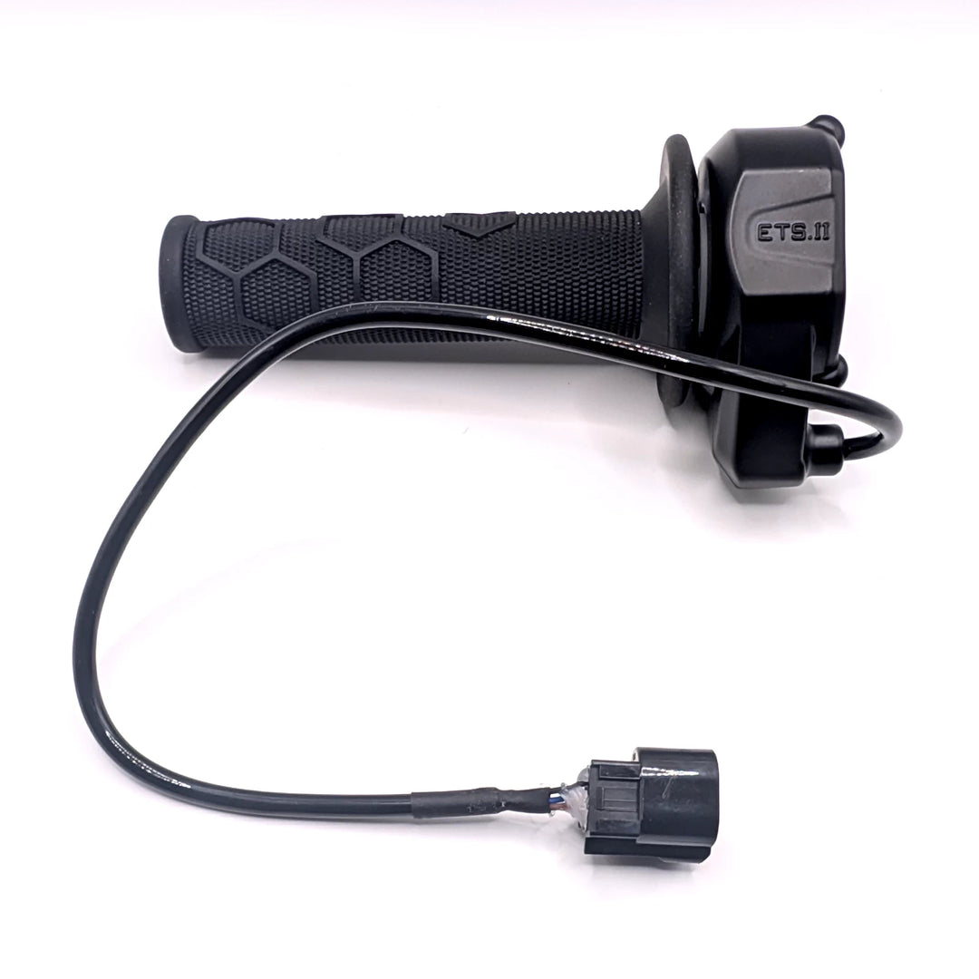 Rear view of original Surron Ultra Bee throttle showing ETS.II housing and connection cable