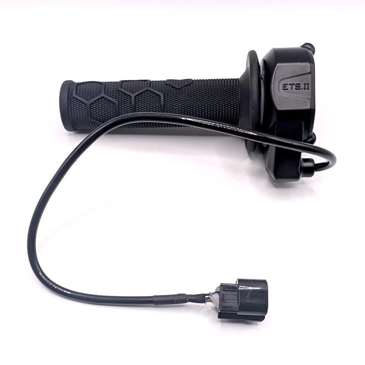 Rear view of original Surron Ultra Bee throttle showing ETS.II housing and connection cable