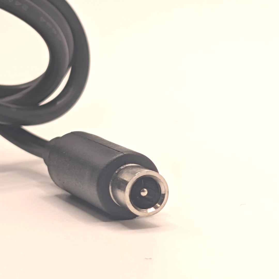 Front detail of the round 8mm charging connector on the TANGSPOWER scooter charger