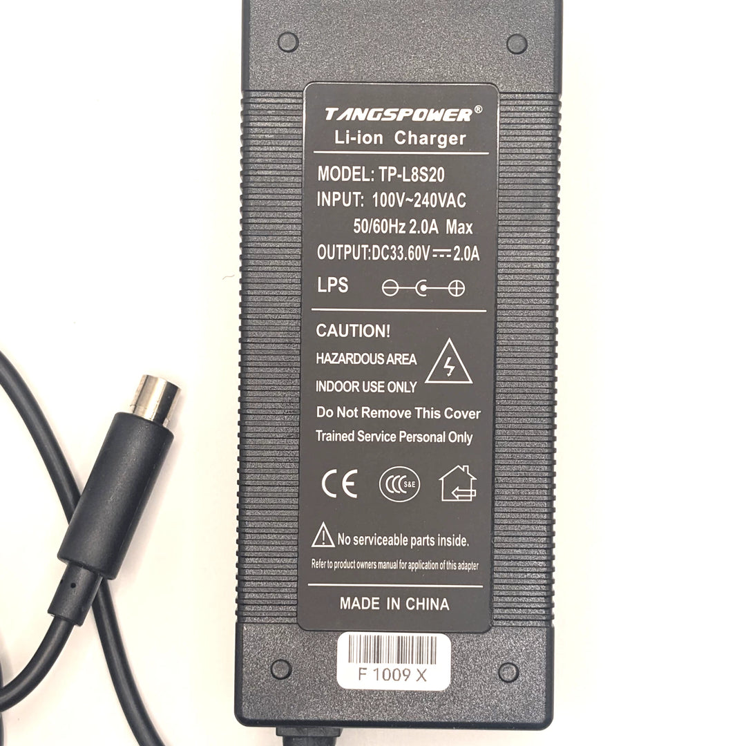 TANGSPOWER TP-L8S20 label showing 33.6V 2A output, 100–240V input and centre-positive polarity
