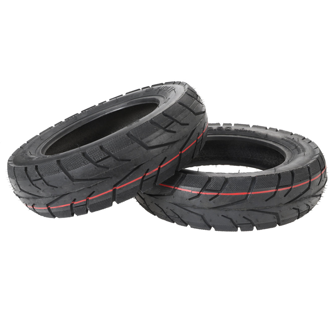 Angled view of two TUOVT 10x2.50 (60/80-6) outer tyres suitable for electric scooters.