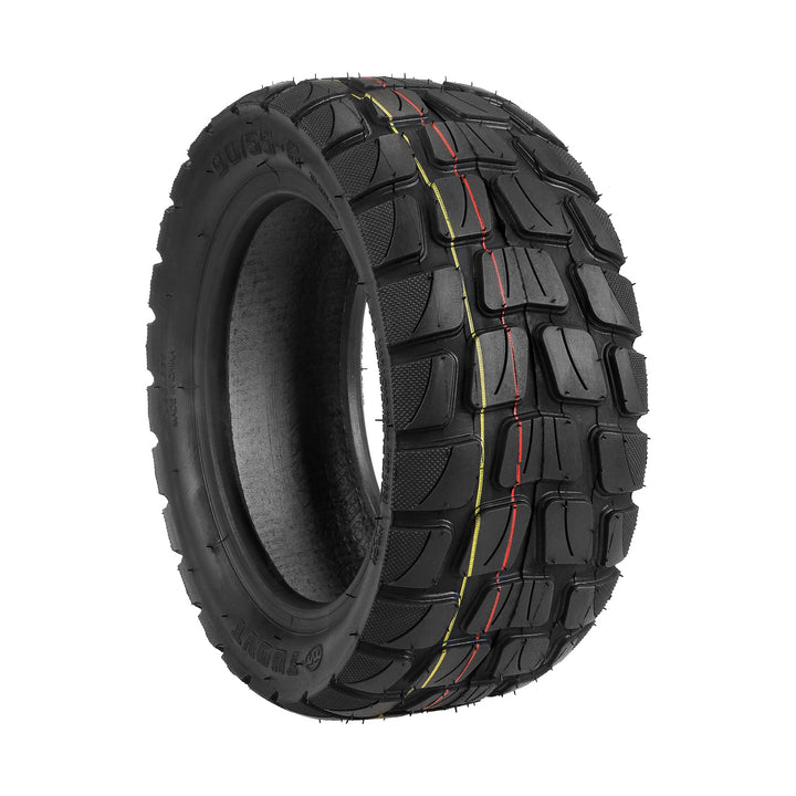 Front view of TUOVT 90/55-6 premium vacuum tyre with wide off-road tread pattern.