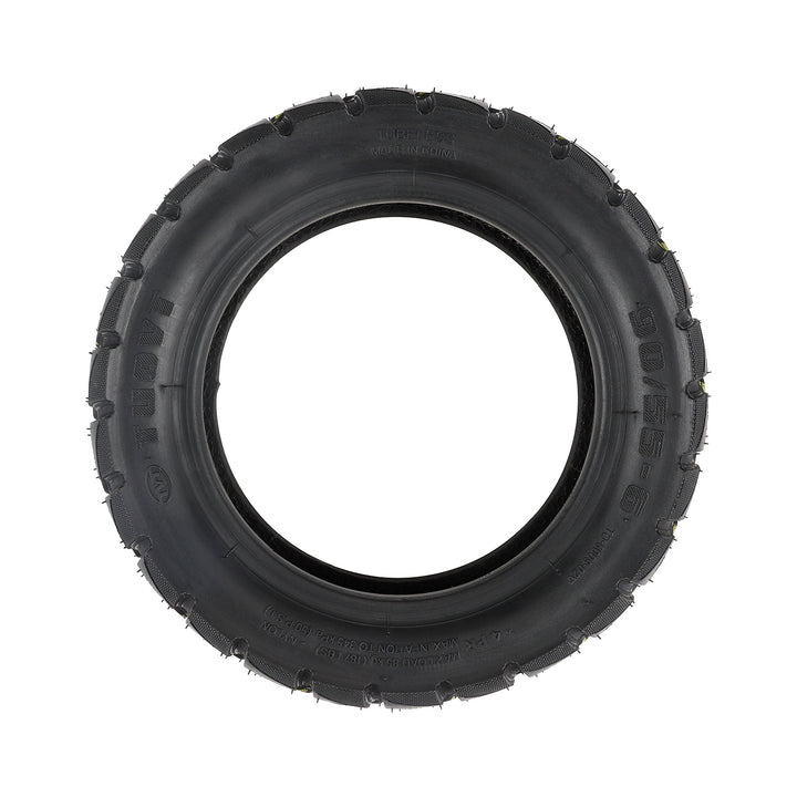 Side profile view of TUOVT 90/55-6 replacement tubeless tyre for electric scooters designed for dirt, gravel and mixed-terrain riding.