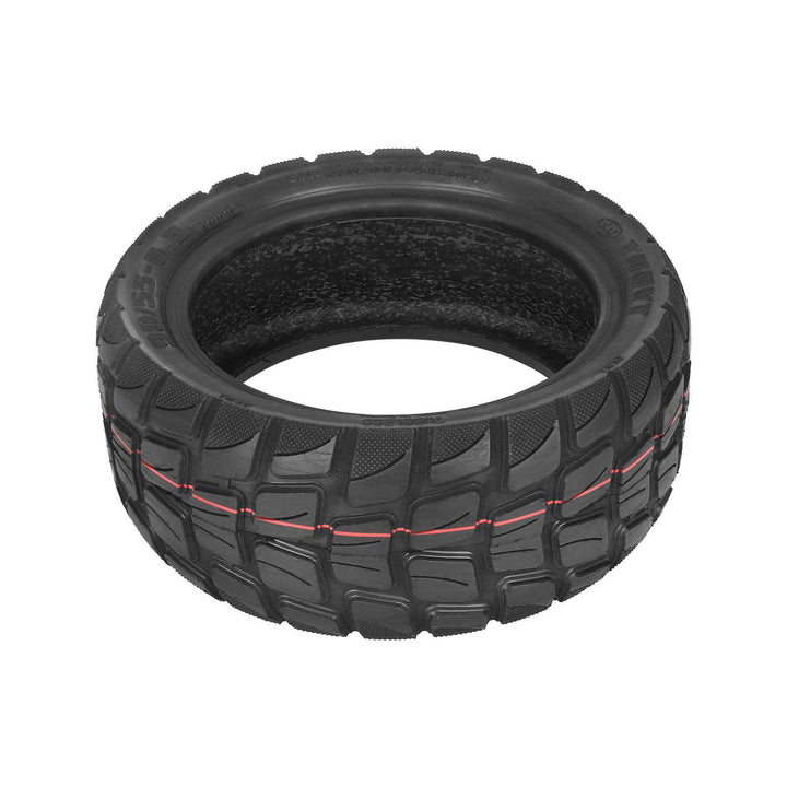 Angled view of TUOVT 90/55-6.5 tubeless off-road electric scooter tyre with block tread pattern.