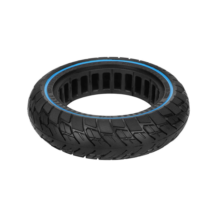 ULIP solid tyre lying flat showing off-road tread, blue ring and cavities around the inner core