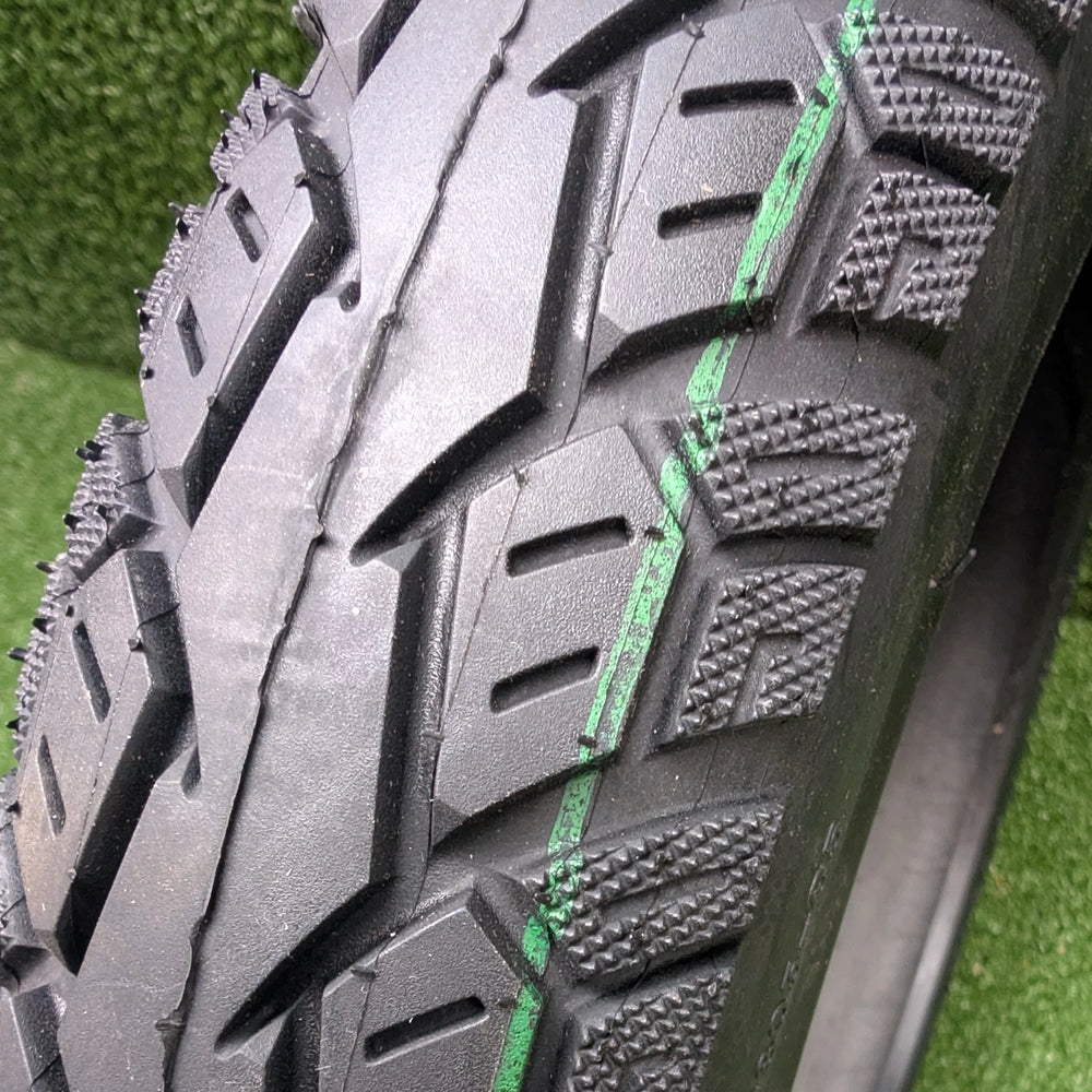 Stippled shoulder tread on ULIP MANLUNG hybrid tyre for additional cornering grip