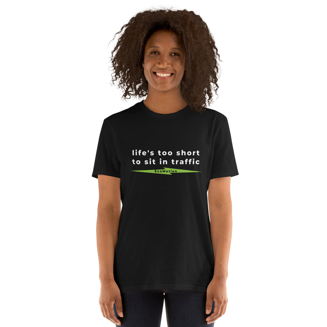 Smiling woman wearing a black EcoMotion T-shirt with the slogan "life's too short to sit in traffic" underlined by a bright green lightning bolt with "EcoMotion" reversed out of the middle.