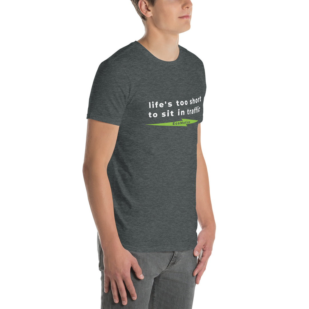 Man wearing a Dark Heather (grey) EcoMotion T-shirt, shown from a front-angled view, with the slogan "life's too short to sit in traffic" on the front.