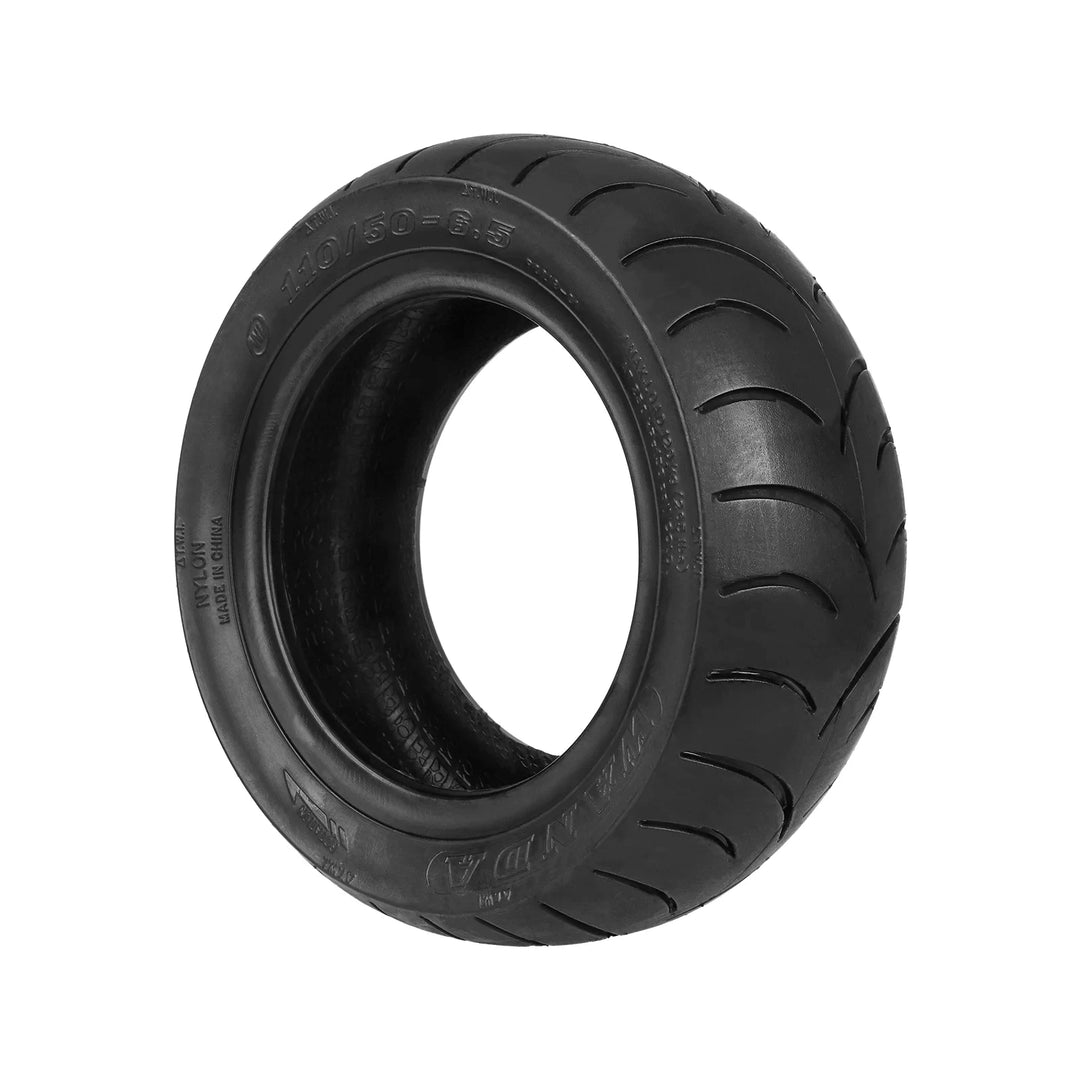 Angled view of Wanda 110/50-6.5 tyre showing nylon construction marking and wide tread