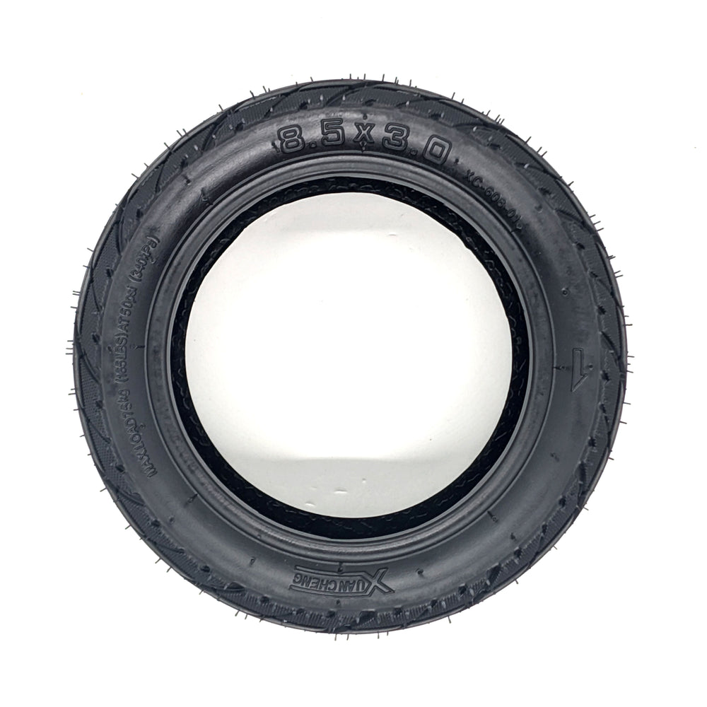 Profile view of Xuancheng 8.5x3.0 vacuum tyre showing wide tread and reinforced sidewalls.