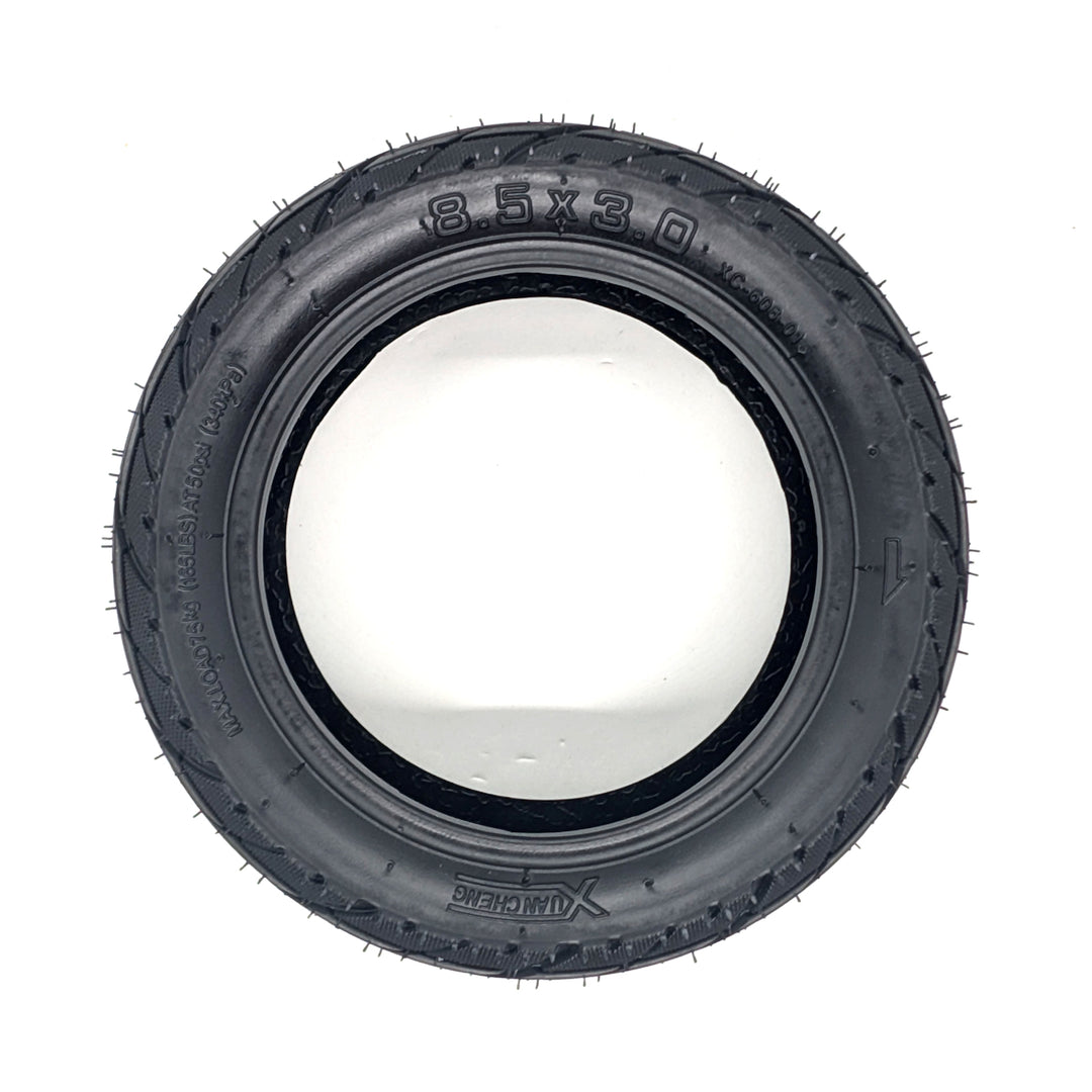 Profile view of Xuancheng 8.5x3.0 vacuum tyre showing wide tread and reinforced sidewalls.