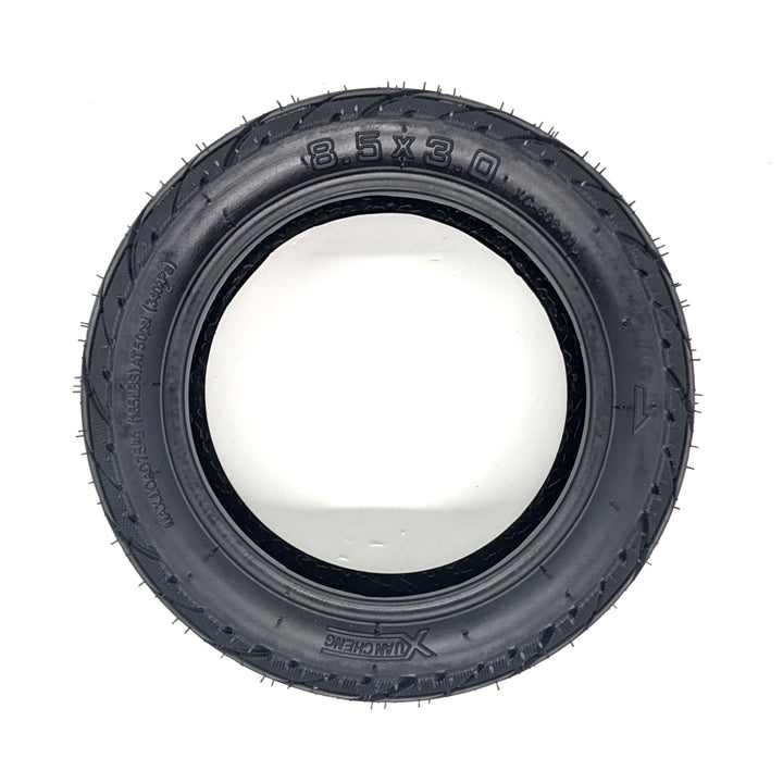 Profile view of Xuancheng 8.5x3.0 vacuum tyre showing wide tread and reinforced sidewalls.