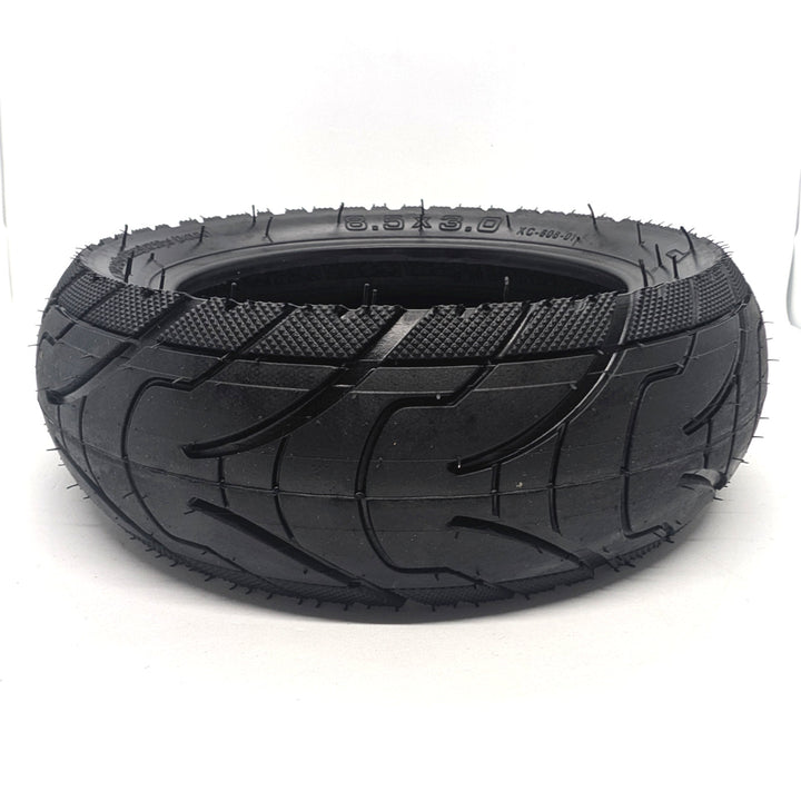 Close-up tread pattern of Xuancheng 8.5x3.0 tubeless tyre for improved wet and dry grip.