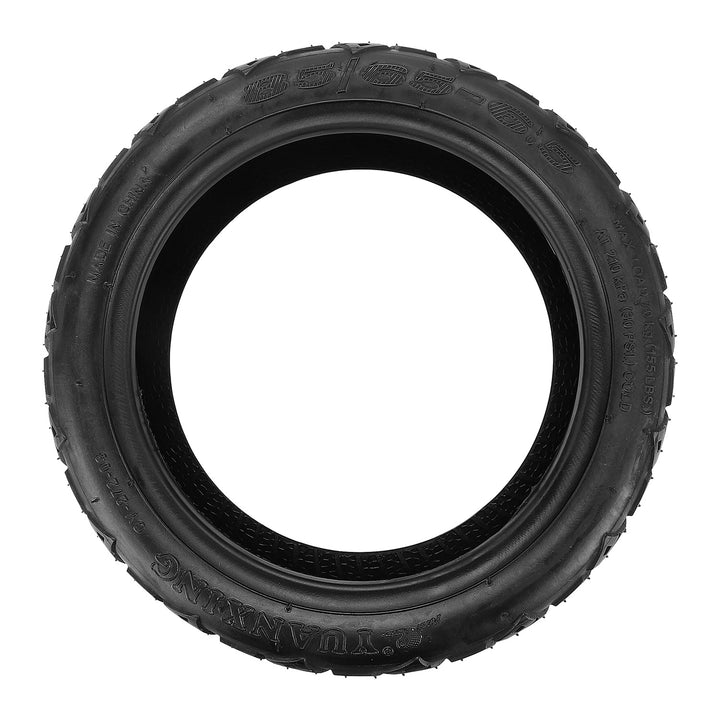 Side profile view of Yuanxing 85/65-6.5 vacuum tyre showing sidewall Yuanxing branding and 85/65-6.5 sizing
