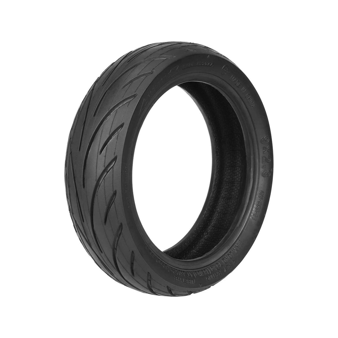 Reverse angle of Yuanxing 9x2.3 tyre showing tread and sidewall size marking