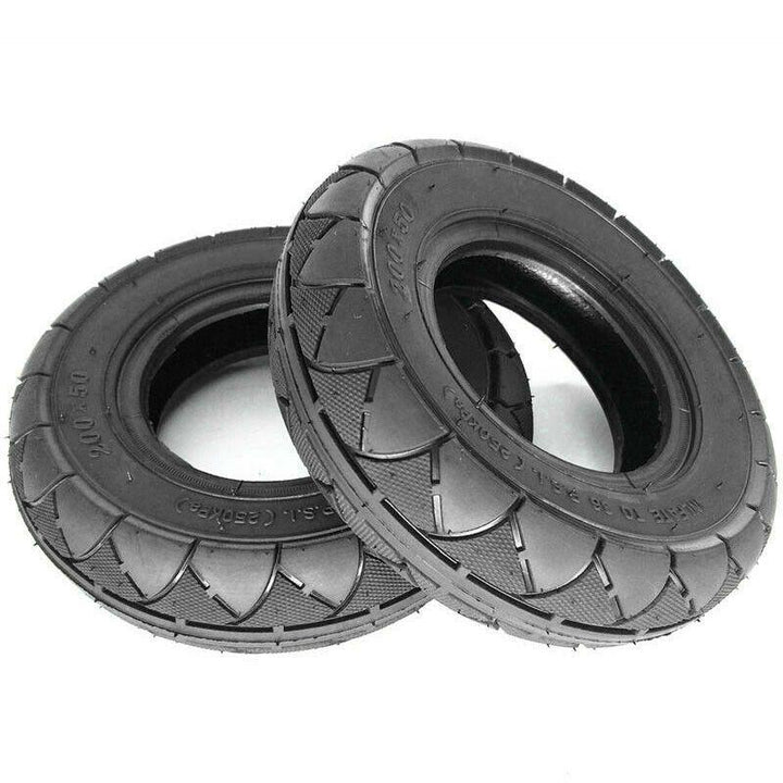 A displayed pair of 8 inch outer tyres/tires, suitable for the front of the EMOVE Touring (Pre 2024) and other electric scooters.