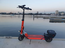 Load image into Gallery viewer, EMOVE Cruiser with Storage Case fitted - St Kilda Pier, Melbourne, Victoria
