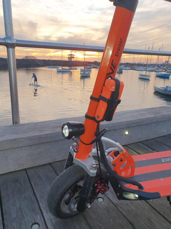 INBIKE Folding lock fitted neatly on the stem of the EMOVE Cruiser, parked on the St Kilda Pier, Melbourne, Australia. Image copyright EcoMotion.